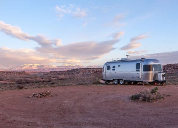 Travel Trailer Parked in Desert